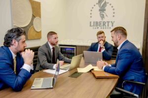Liberty Law Group Team in a Meeting