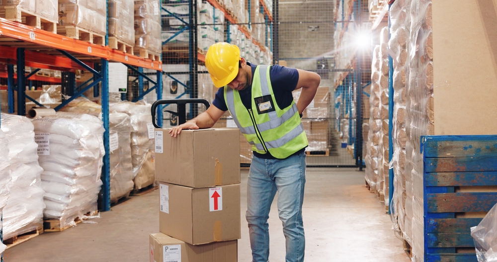 Warehouse worker experiencing injury on the job