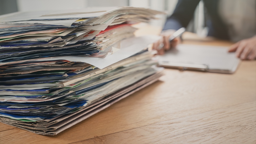 Stylized image of lawyer reviewing case documents